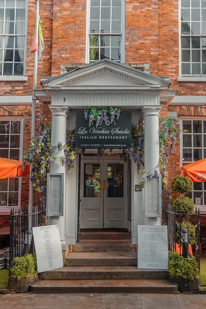 The historic entrance of La Vecchia Scuola Italian restaurant in York