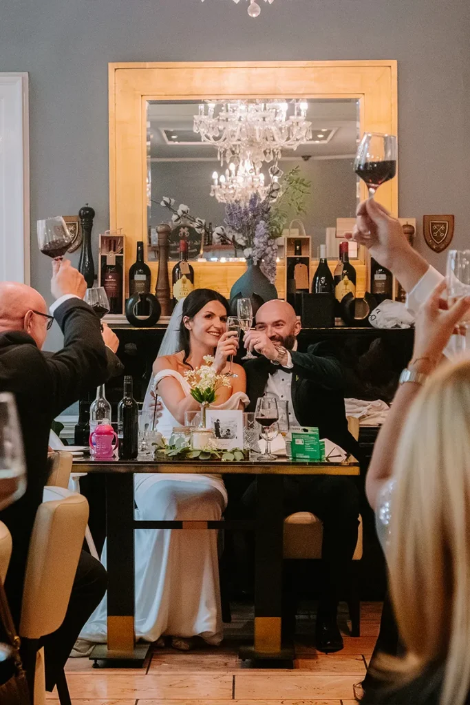 Bride and groom celebrating with guests during a wedding reception at La Vecchia Scuola York