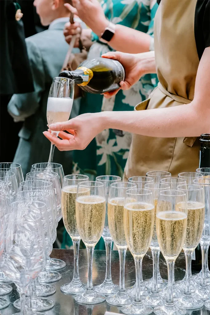 Sparkling wine being poured for guests at a celebration at La Vecchia Scuola York